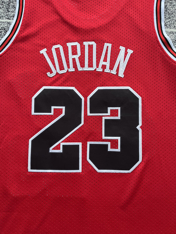 Red Chicago Bulls basketball jersey, back lettering and number detail