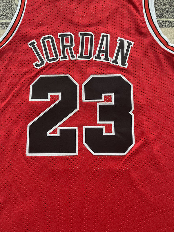 Red Chicago Bulls basketball jersey, back lettering and number detail