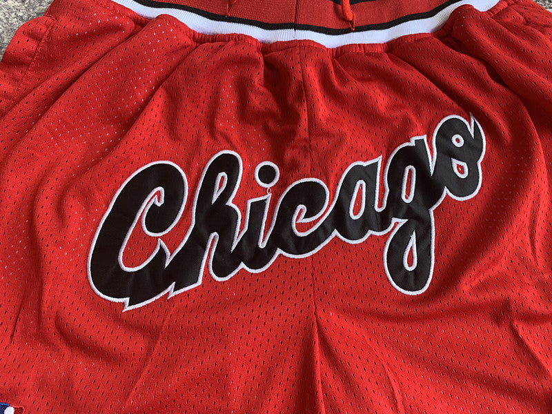 Red Chicago Bulls premium basketball shorts, graphic detail