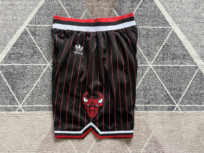 Black and Red and White Chicago Bulls basketball shorts, side panel detail