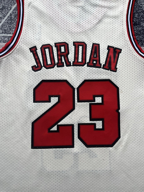 Yellow Chicago Bulls basketball jersey, back lettering and number detail