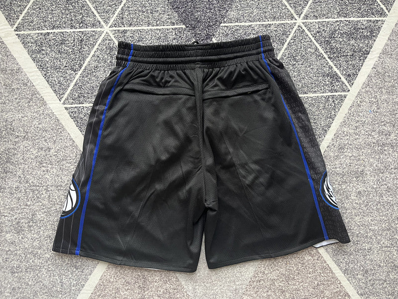 Black Dallas Mavericks premium basketball shorts, full back view