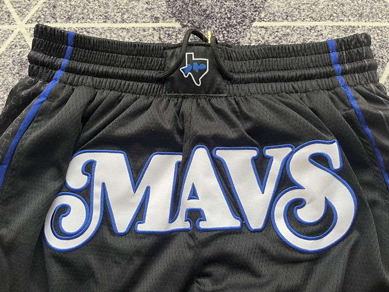 Black Dallas Mavericks premium basketball shorts, waistband and label detail