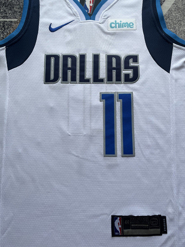 White Dallas Mavericks basketball jersey, front graphic detail