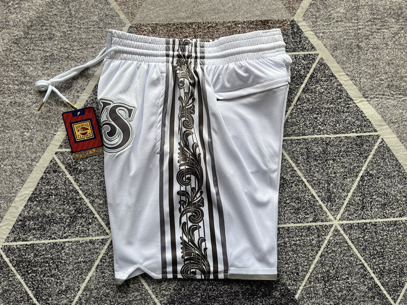 White Dallas Mavericks premium basketball shorts, waistband and label detail