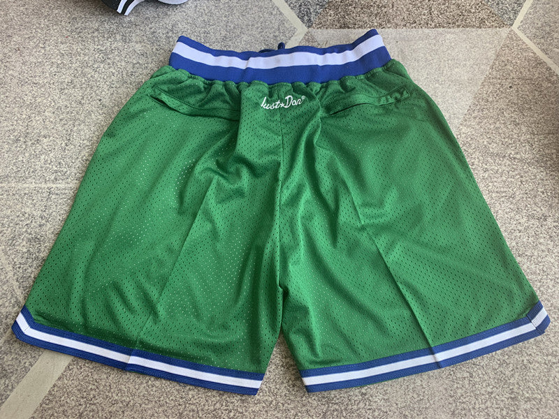 Green Dallas Mavericks premium basketball shorts, full back view