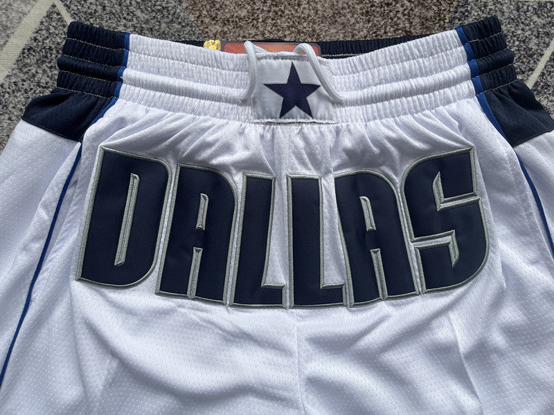 White Dallas Mavericks premium basketball shorts, waistband and label detail