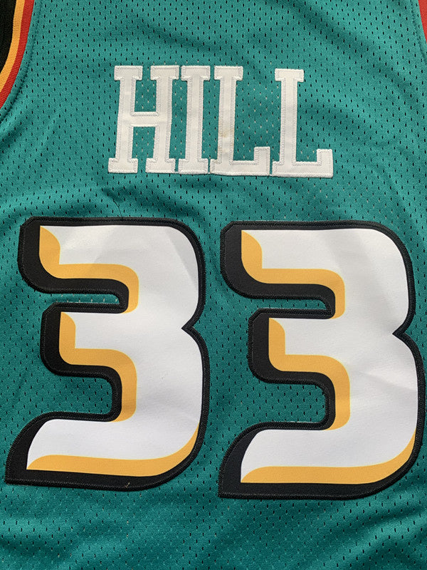 Green Detroit Pistons basketball jersey, back lettering and number detail