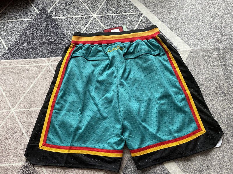 Green Detroit Pistons premium basketball shorts, full back view