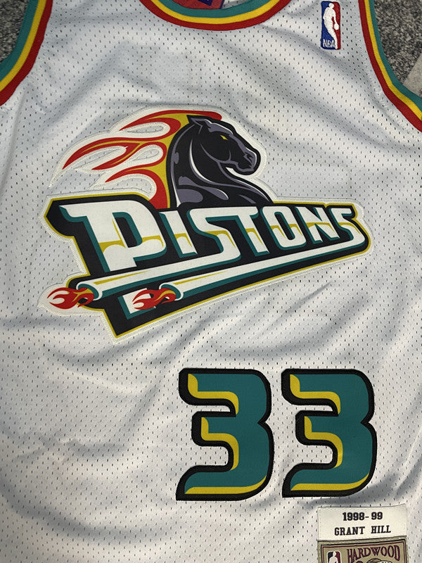 White Detroit Pistons basketball jersey, front graphic detail