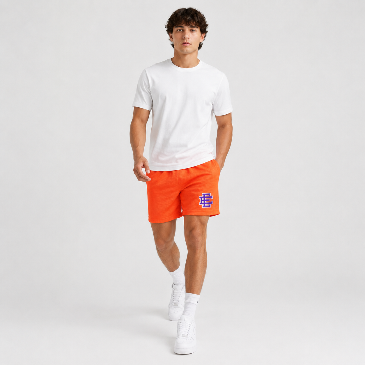Neon Orange mesh shorts - lifestyle view