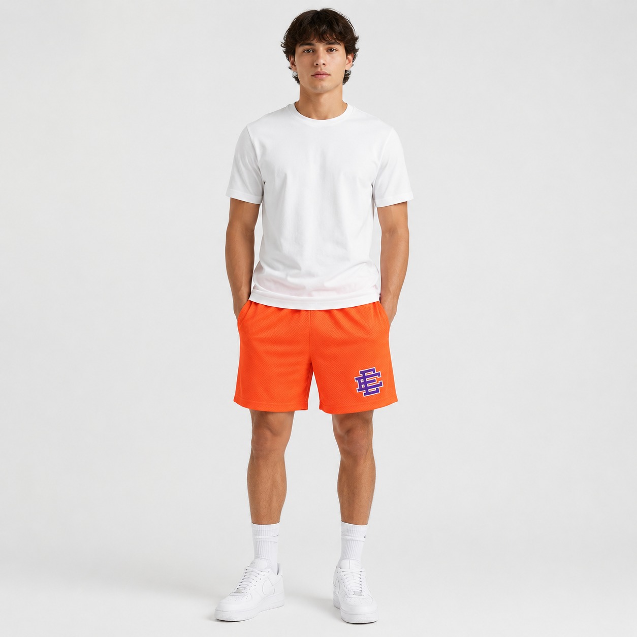 Neon Orange mesh shorts - front angle view