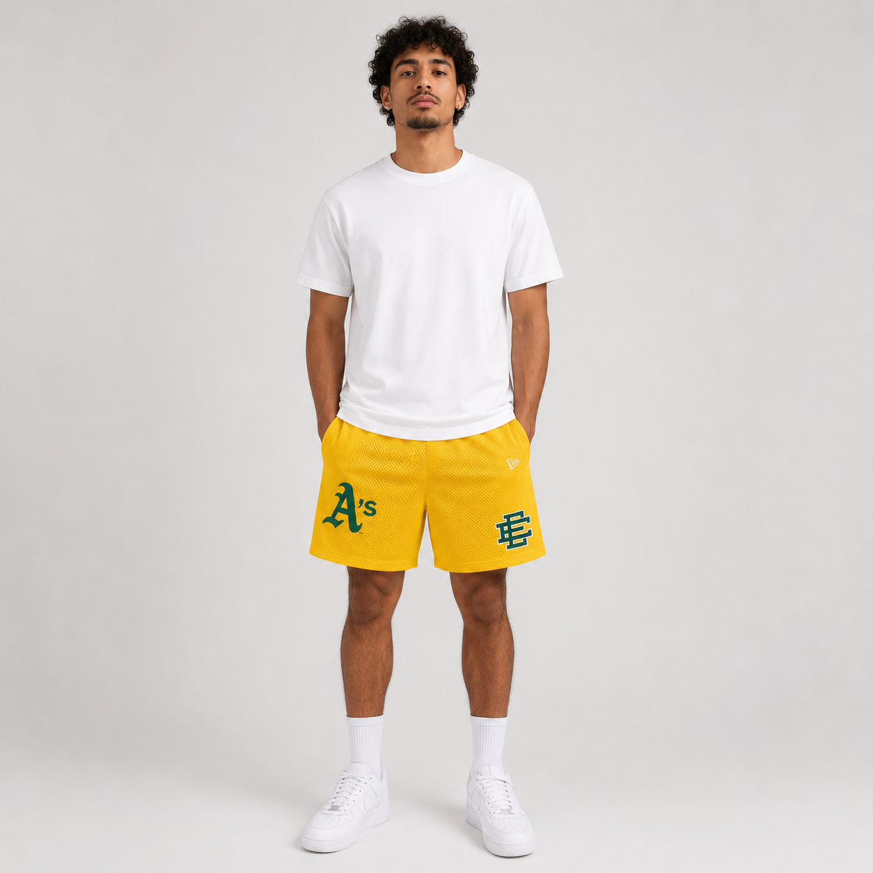 Athletics Gold mesh shorts - front angle view