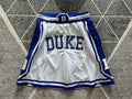 White Duke premium basketball shorts, full front view