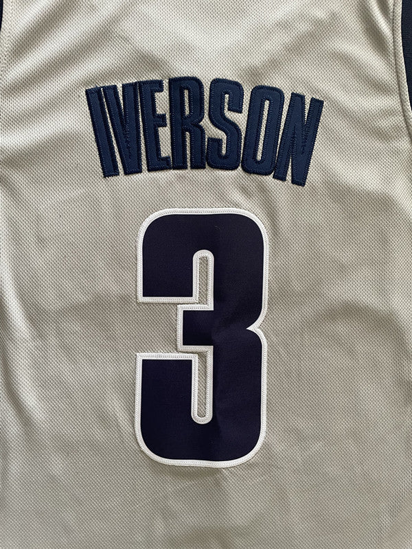 Gray George basketball jersey, back lettering and number detail