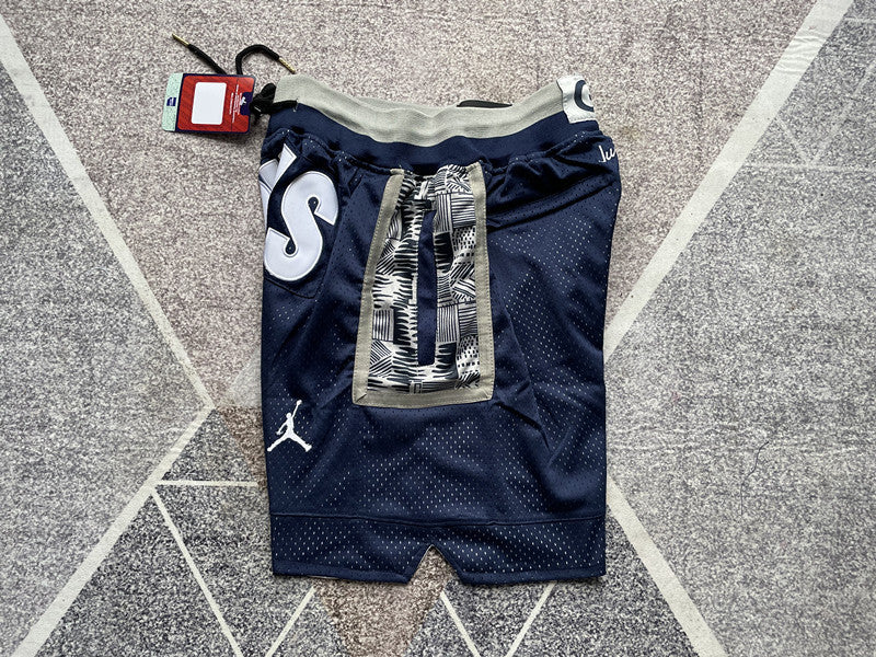 Navy Georgetown premium basketball shorts, side panel detail