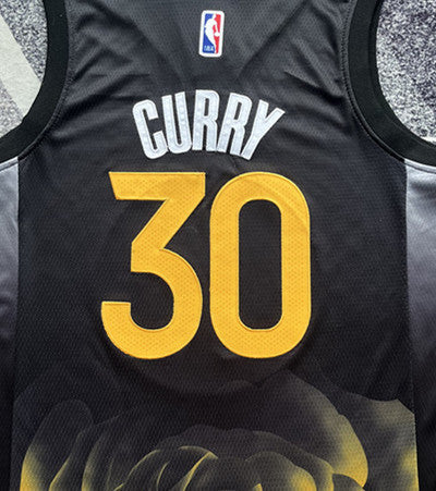 Black Golden State Warriors basketball jersey, back lettering and number detail