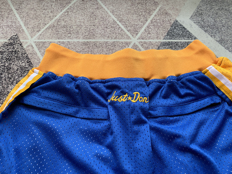 Blue Golden State Warriors premium basketball shorts, waistband and label detail