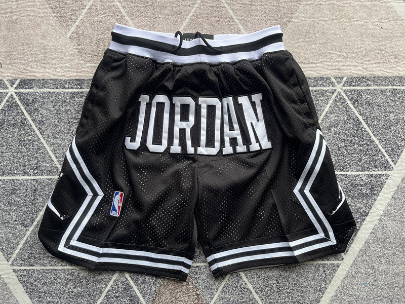 Black Jumpman premium basketball shorts, full front view