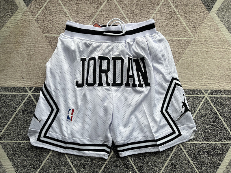 White Jumpman premium basketball shorts, full front view