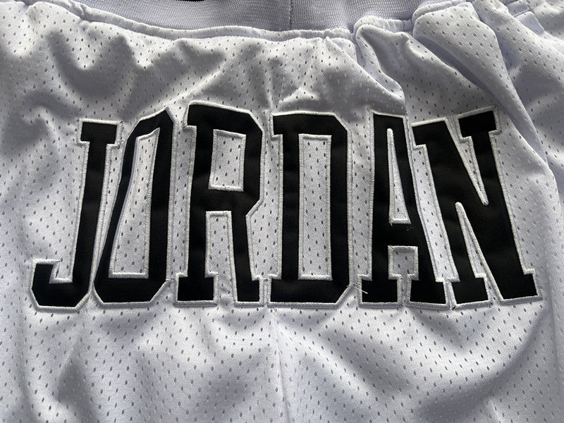 White Jumpman premium basketball shorts, graphic detail