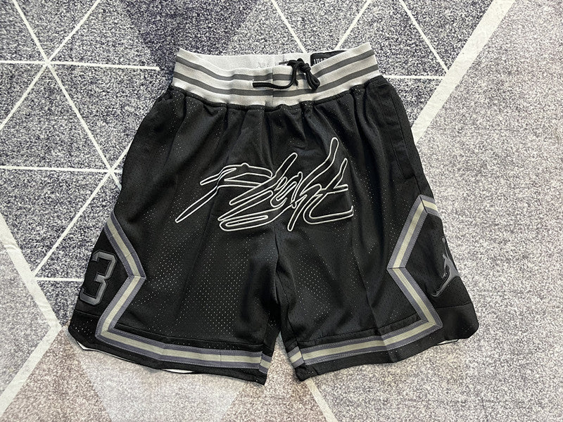 Black Jumpman premium basketball shorts, full front view