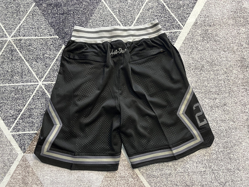 Black Jumpman premium basketball shorts, full back view