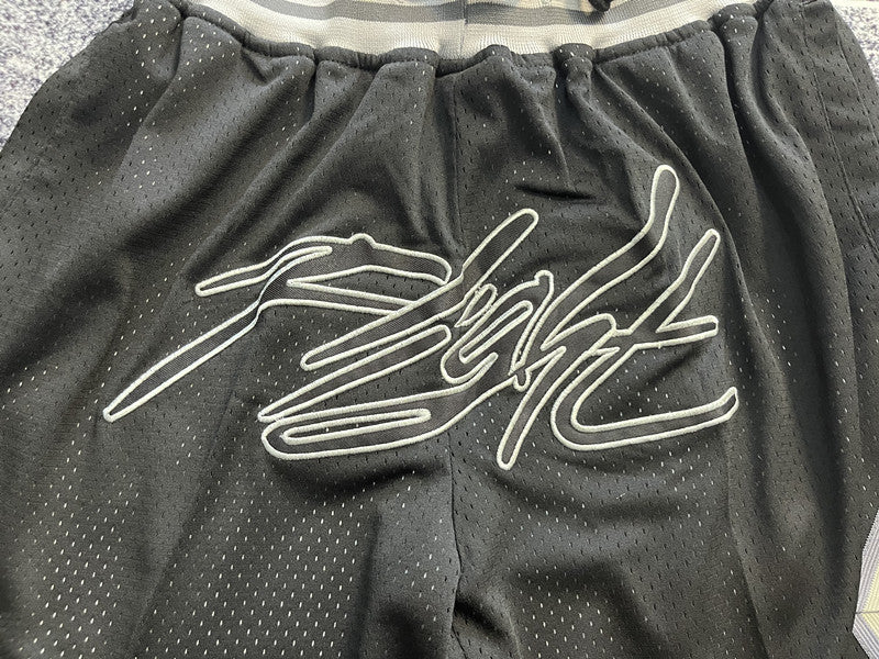 Black Jumpman premium basketball shorts, graphic detail