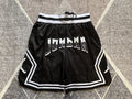 Black Jumpman premium basketball shorts, full front view
