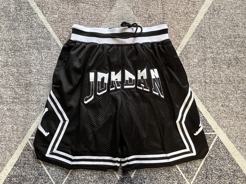 Black Jumpman premium basketball shorts, full front view