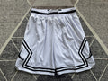 White Jumpman basketball shorts, full front view