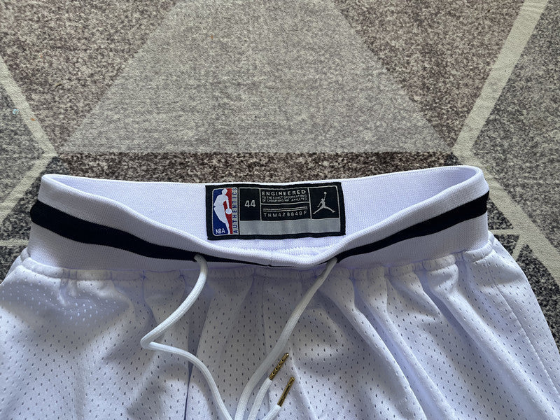 White Jumpman basketball shorts, waistband and logo detail