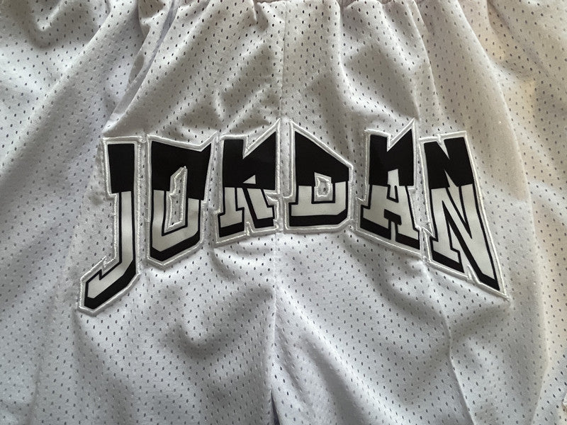White Jumpman premium basketball shorts, graphic detail