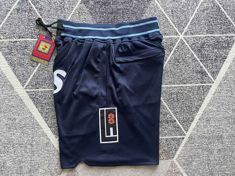 Navy LA Clippers premium basketball shorts, side panel detail