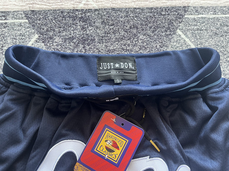 Navy LA Clippers premium basketball shorts, waistband and label detail