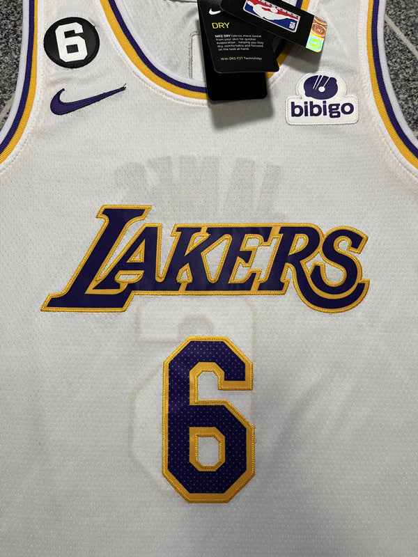 White LA Lakers basketball jersey, front graphic detail