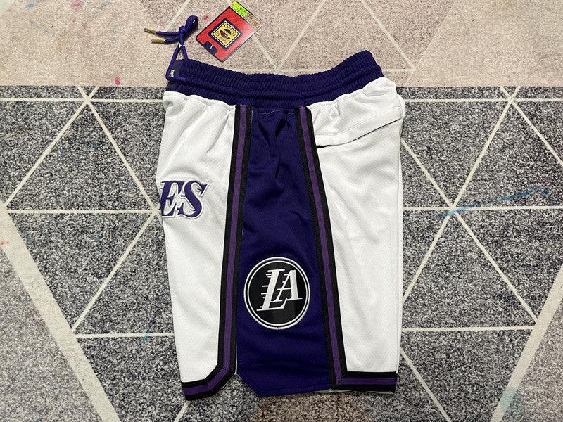 White LA Lakers premium basketball shorts, side panel detail