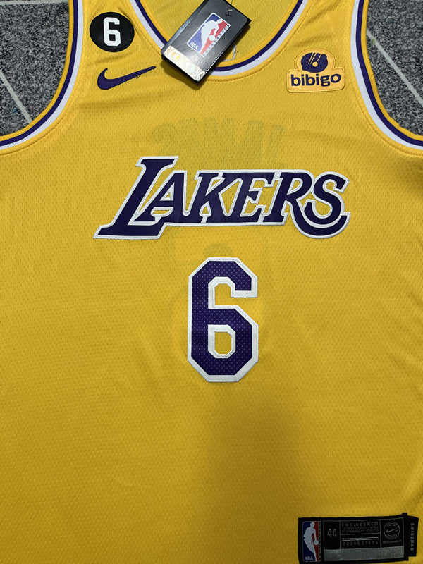 Yellow LA Lakers basketball jersey, front graphic detail