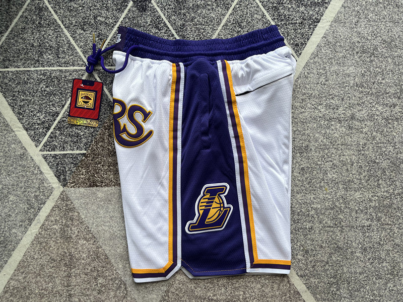 White LA Lakers premium basketball shorts, side panel detail