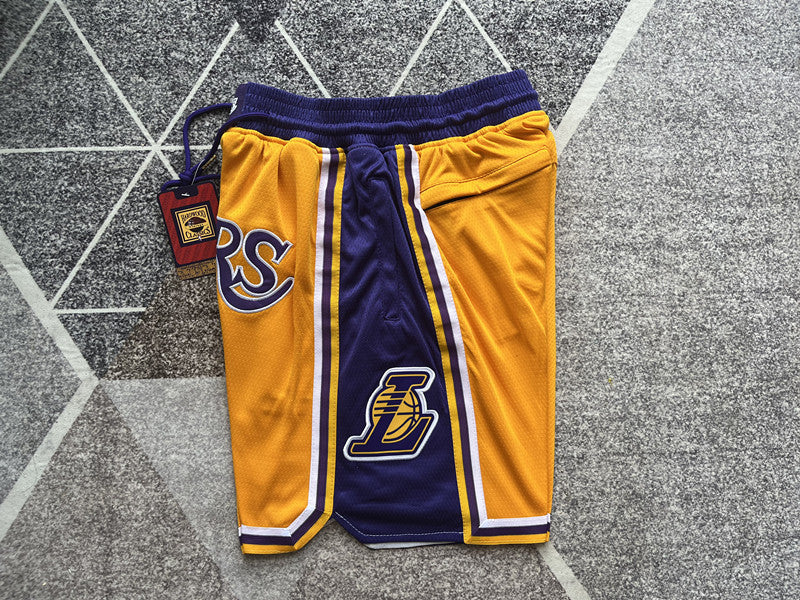 Yellow LA Lakers premium basketball shorts, side panel detail