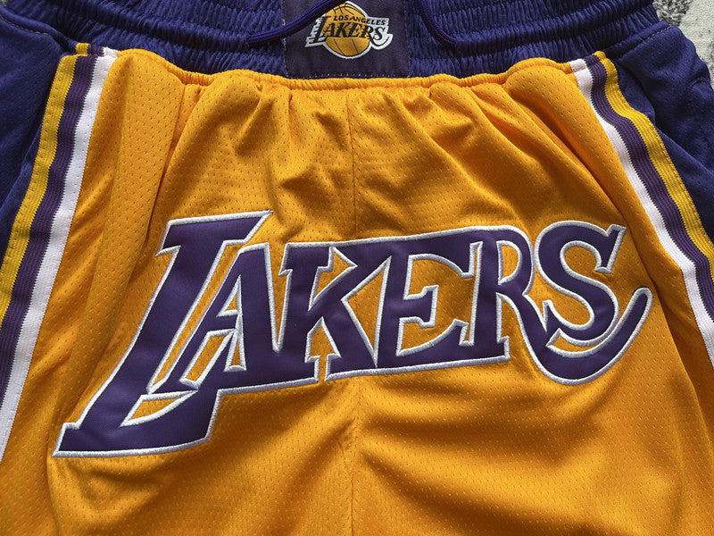 Yellow LA Lakers premium basketball shorts, graphic detail