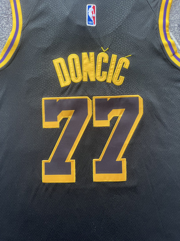 Multi-color LA Lakers basketball jersey, back lettering and number detail
