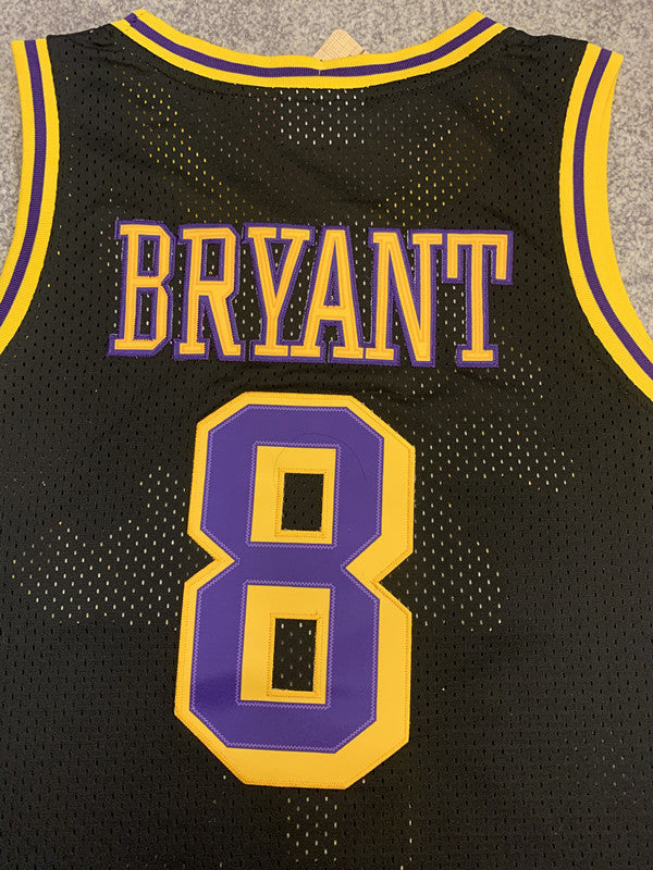 Black LA Lakers basketball jersey, back lettering and number detail