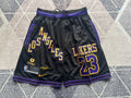 Black LA Lakers premium basketball shorts, full front view
