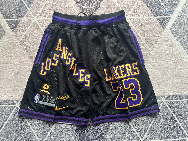 Black LA Lakers premium basketball shorts, full front view