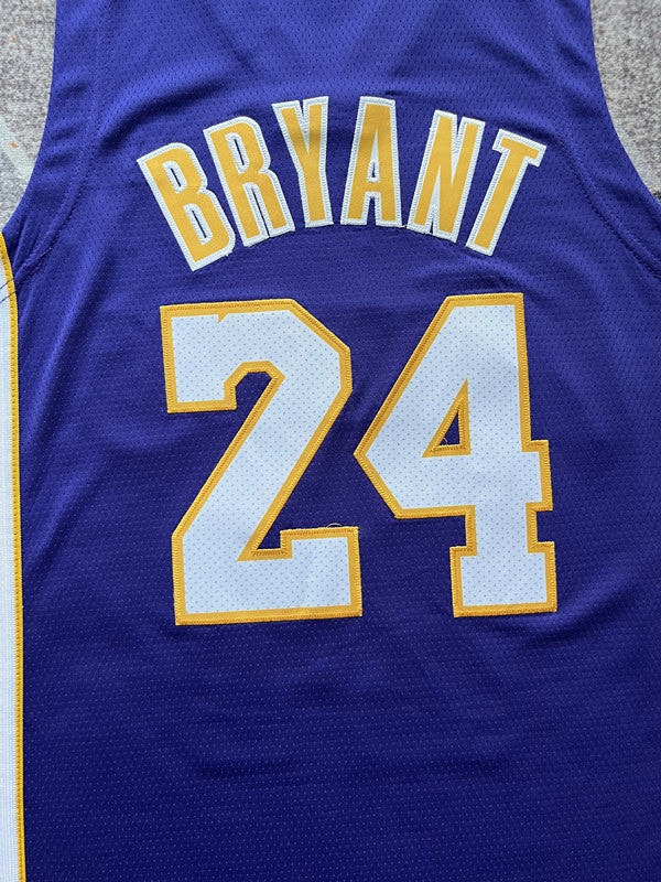 Purple LA Lakers basketball jersey, back lettering and number detail