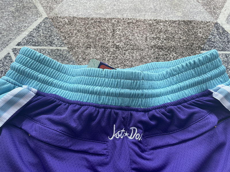 Purple LA Lakers premium basketball shorts, waistband and label detail
