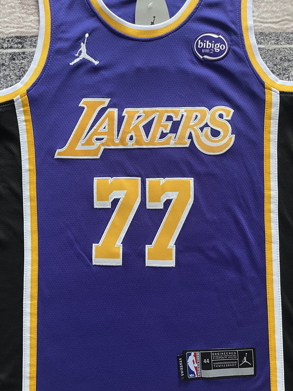 Purple LA Lakers basketball jersey, front graphic detail