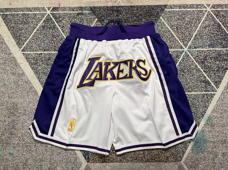 White and purple LA Lakers premium basketball shorts, full front view
