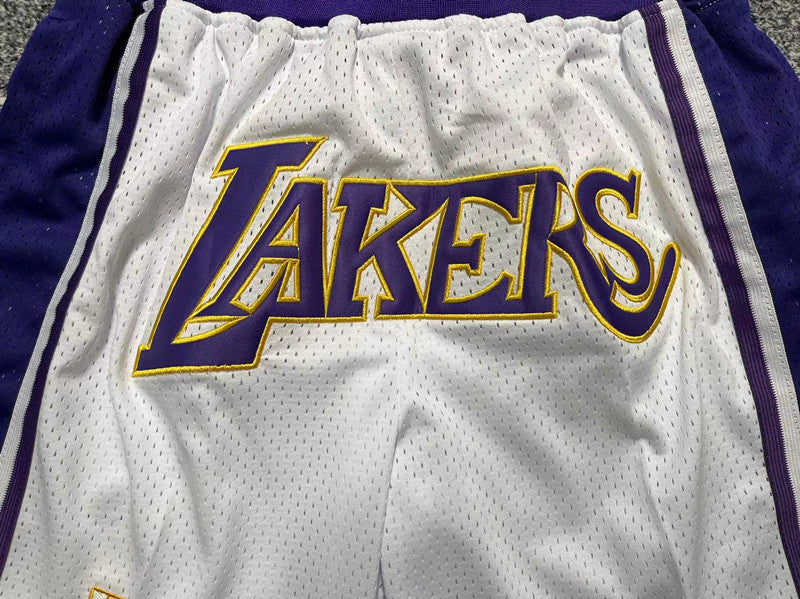 White and purple LA Lakers premium basketball shorts, graphic detail